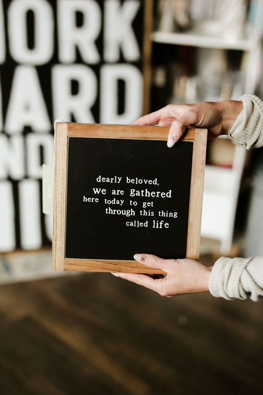 Dearly Beloved We Are Gathered Here Today To Get Through This Thing We Call Life Framed Wood Sign